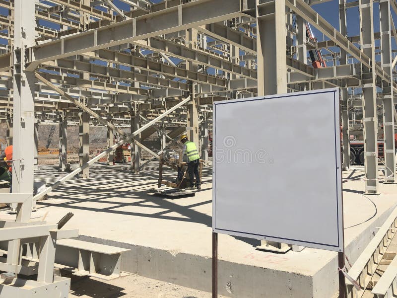 Object Under Construction Stand at the Construction Site.Blank Display Board Against