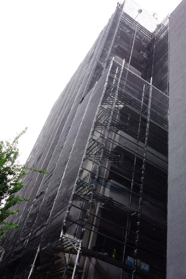 After a long time, scaffolding assembly for the renewal work of the outer wall of the condominium. After a long time, scaffolding assembly for the renewal work of the outer wall of the condominium.