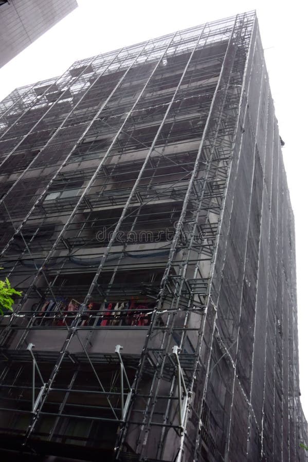 After a long time, scaffolding assembly for the renewal work of the outer wall of the condominium. After a long time, scaffolding assembly for the renewal work of the outer wall of the condominium.