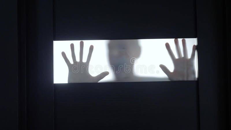 Silhouette of Man Banging on Window From, Stock Video