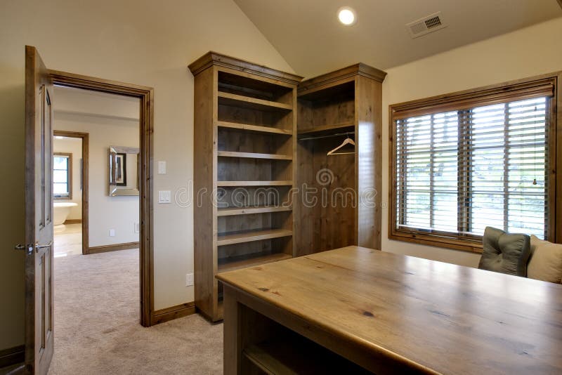 Custom Walk In Closet with Custom Wood Work. Custom Walk In Closet with Custom Wood Work