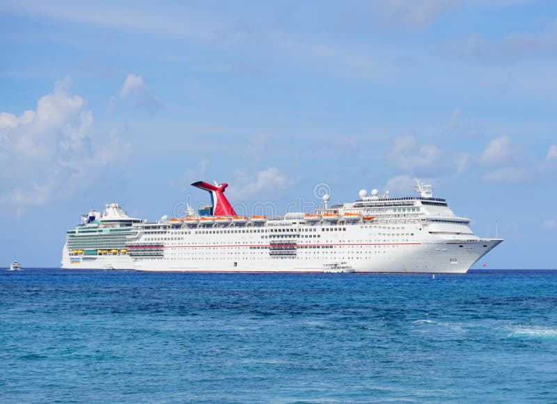 Georgetown, Cayman Island - 11 20 2018: Caribbean sea ocean and cruise ship. Georgetown, Cayman Island - 11 20 2018: Caribbean sea ocean and cruise ship