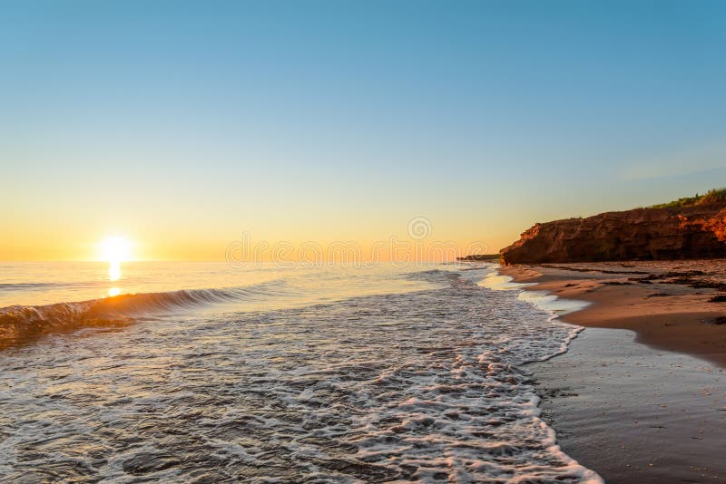 Ocean coast at the sunrise (Thunder Cove, Prince Edward Island, Canada)