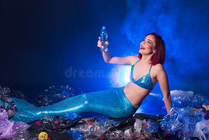 Ocean Pollution, Rubbish in the Water. Stupid Fairytale Mermaid in