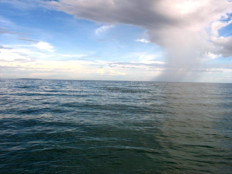 Ocean Rain stock photo. Image of clouds, blue, rain, skies 6202620