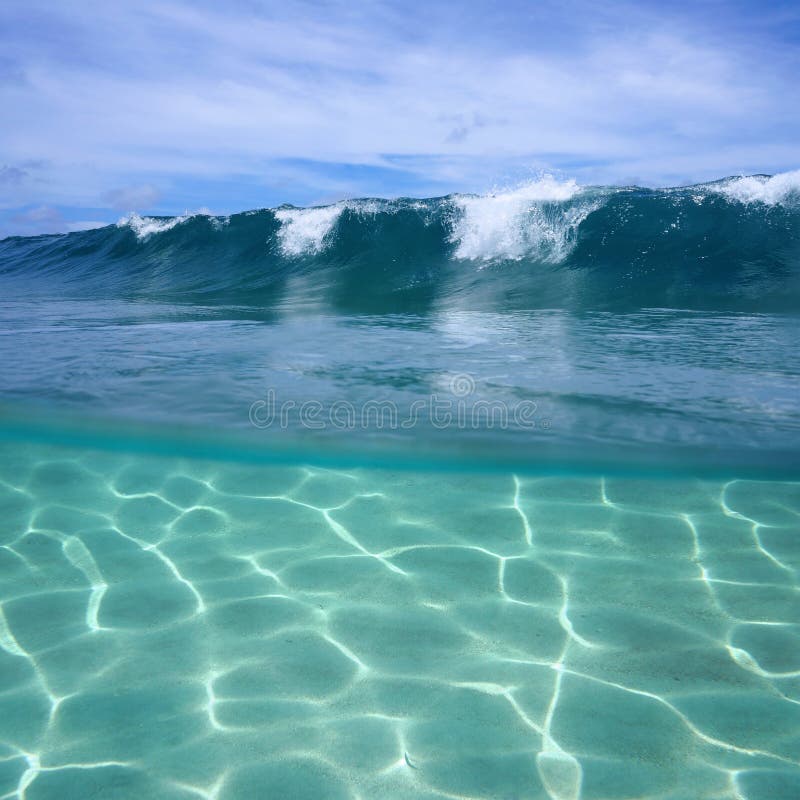 Ocean wave breaking and underwater sandy seabed