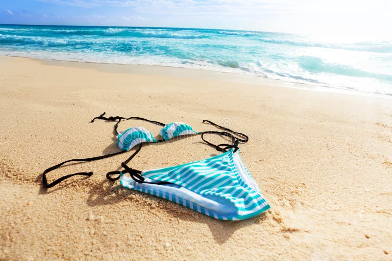 Ocean and women swimsuit stock photo. Image of wave, accessory - 39411088