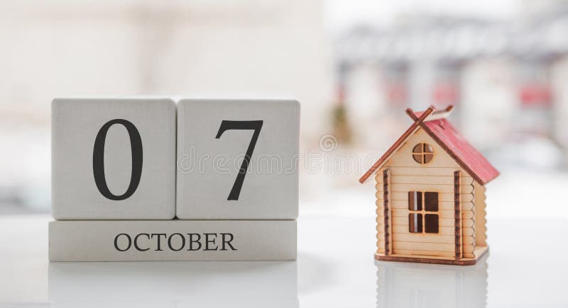 October calendar and toy home. Day 7 of month. Card message for print or remember