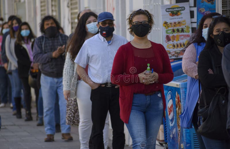 Chileans lining up in the Chile 2020 national plebiscite.