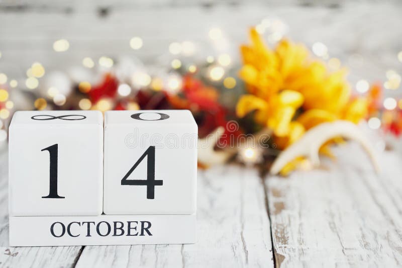 October 14th Calendar Blocks with Autumn Decorations Stock Photo