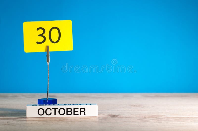 October 30th. Day 30 of october month, calendar on workplace with blue background. Autumn time. Empty space for text royalty free stock photo October 30th. Day 30 of october month, calendar on workplace with blue background. Autumn time. Empty space for text royalty free stock photo