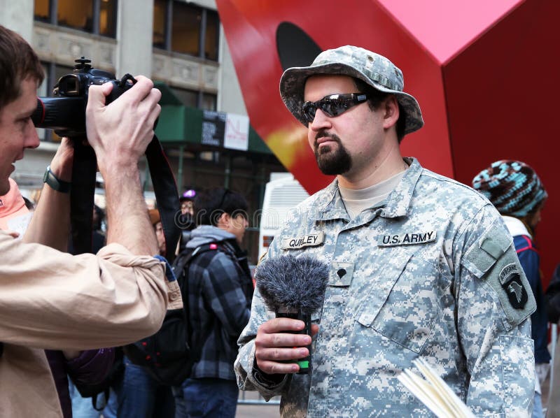 About 100 military veterans were joining the Occupy Wall Street protest in Manhattan.They were marching to show support with a former Marine whose skull was fractured in Oakland rally and also protesting against injustice in the army. About 100 military veterans were joining the Occupy Wall Street protest in Manhattan.They were marching to show support with a former Marine whose skull was fractured in Oakland rally and also protesting against injustice in the army.