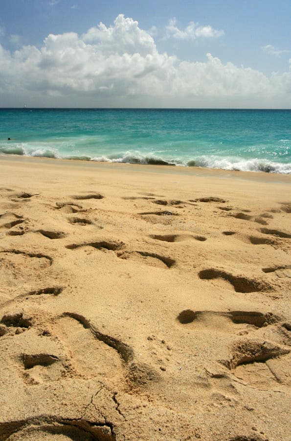 Footprints in the sand, Maho Bay, St. Maarten. Footprints in the sand, Maho Bay, St. Maarten.