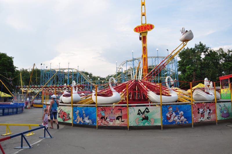 Odessa, South of Ukraine, Uspenskaya street, Lunapark, July 10, 2018. Walking on the city streets in summer. Attractions, Ferris w royalty free stock images Odessa, South of Ukraine, Uspenskaya street, Lunapark, July 10, 2018. Walking on the city streets in summer. Attractions, Ferris w royalty free stock images