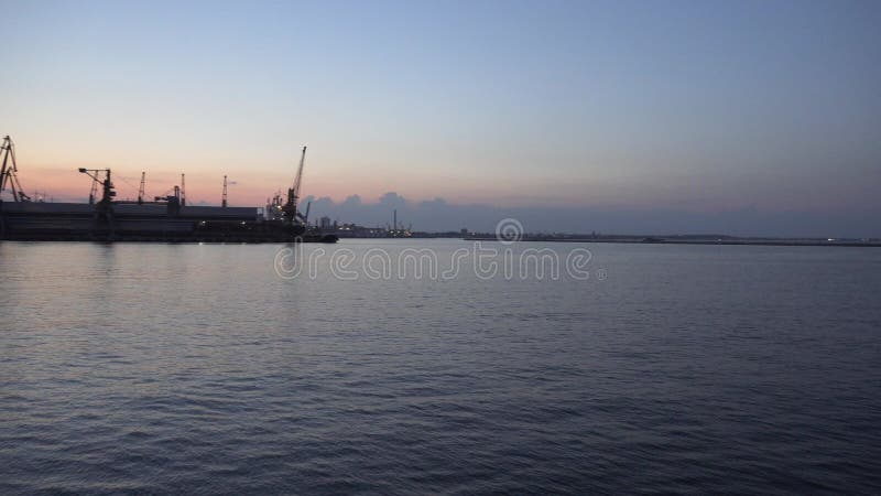 Odessa, Ukraine - Aug 24, 2019: Marine port cranes of Odessa sea port in Ukraine.