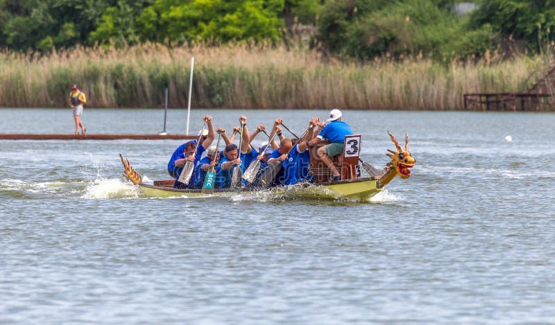 ODESSA, UKRAINE - July 1, 2019: Dragon Boat Festival. Dragon Boat Festival in the river. Dragon boat competitions on the day of
