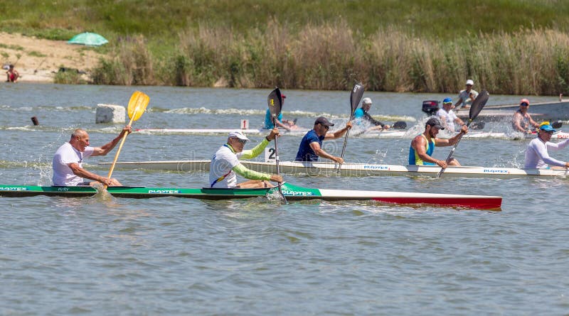 ODESSA, UKRAINE - June 1, 2019: Ukrainian rowing championship. Rowers on a sports boat on the water of a rowing canal during the