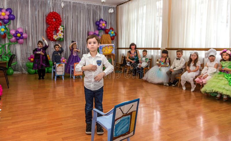 Odessa, Ukraine - March 4, 2016: children`s music groups singing