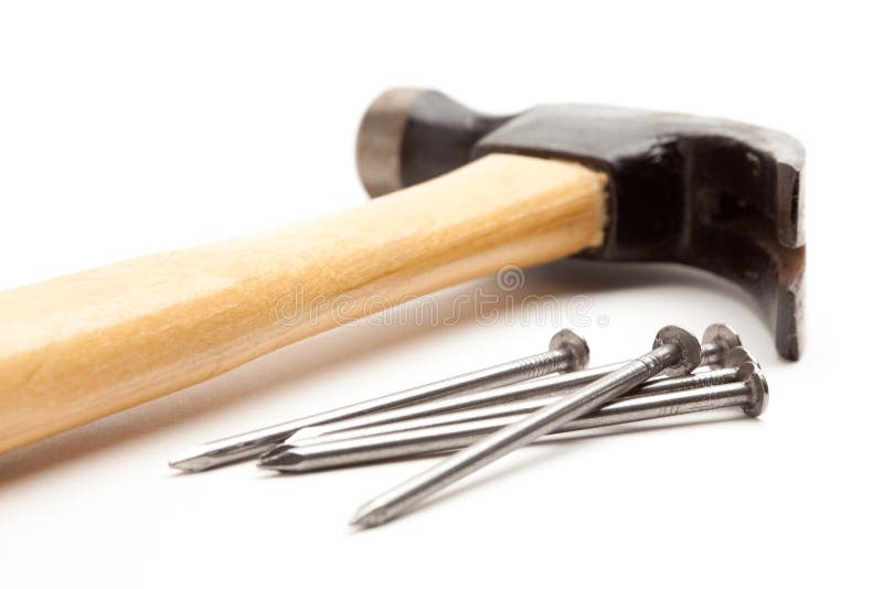 Hammer and Nails Isolated on a White Background. Hammer and Nails Isolated on a White Background.