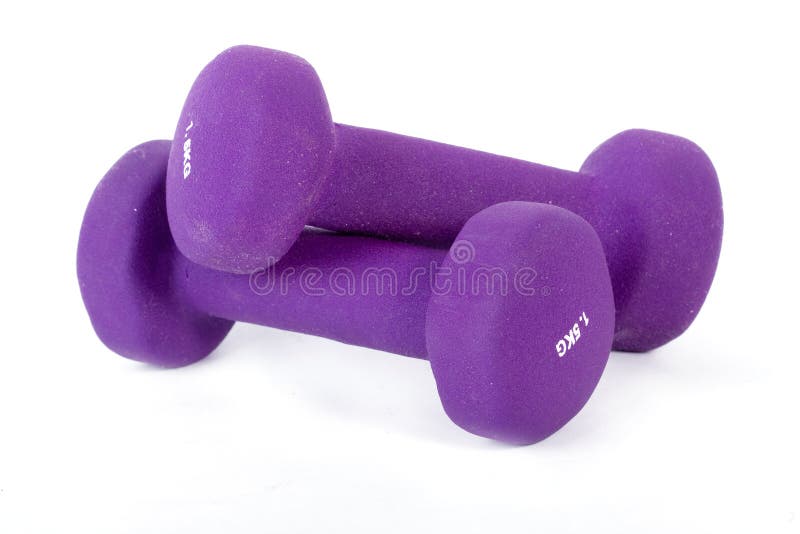 Two purple 1.5 kg weights, isolated on white background. Two purple 1.5 kg weights, isolated on white background