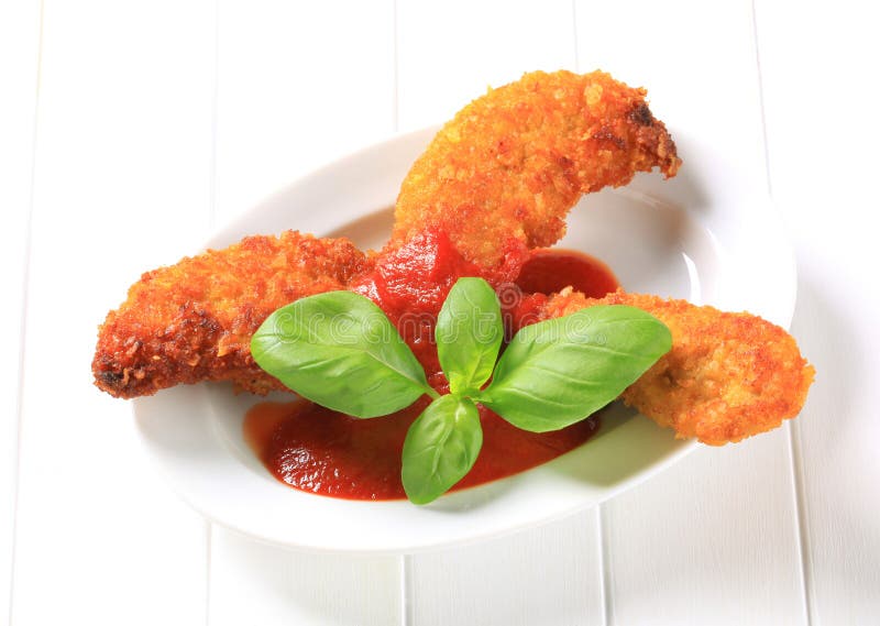 Ofertas curruscantes del pollo foto de archivo Ofertas curruscantes del pollo foto de archivo