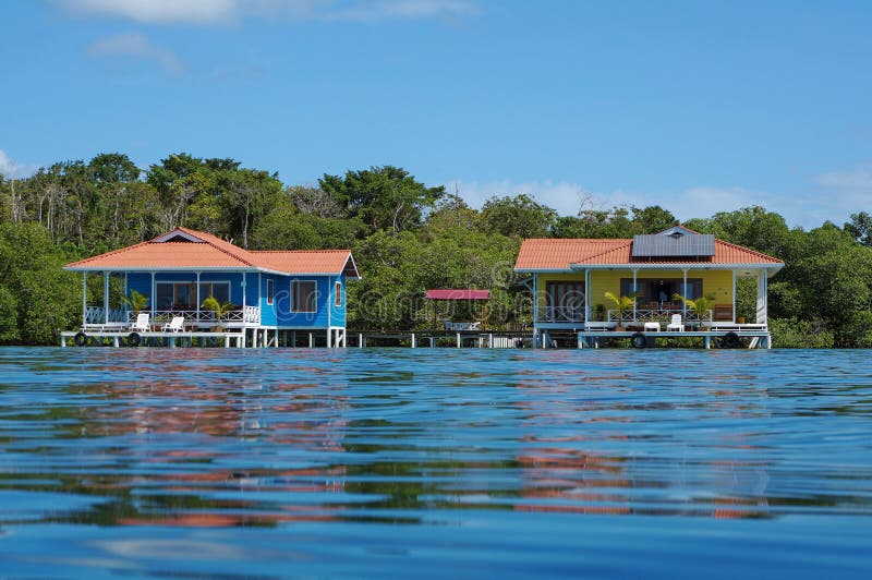 Off grid over water bungalows with solar panels