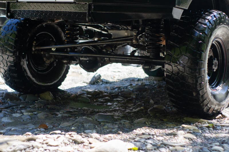 Off Road Car Suspension. Wheel of the Offroad Pickup Stock Photo
