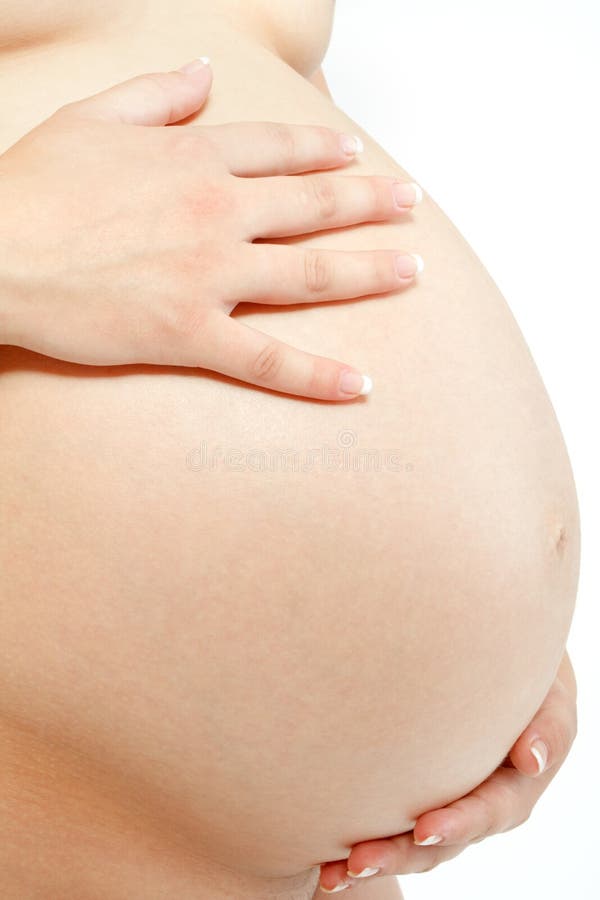 Offerta della donna incinta che tiene la sua pancia fotografie stock libere da diritti Offerta della donna incinta che tiene la sua pancia fotografie stock libere da diritti