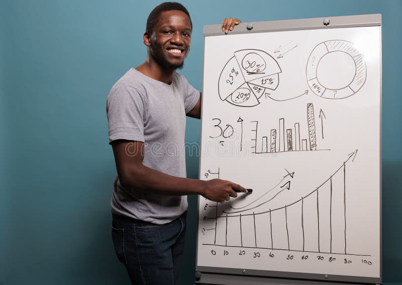 Office assistant doing project presentation with charts stock photography