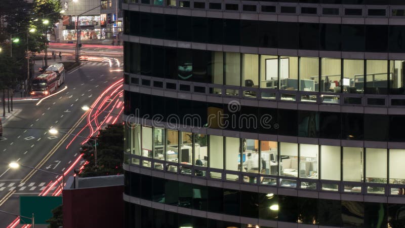 Office building in evening lights stock images Office building in evening lights stock images