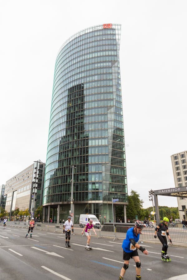 Office building and races on rollers at Berlin Roller Marathon royalty free stock photo Office building and races on rollers at Berlin Roller Marathon royalty free stock photo