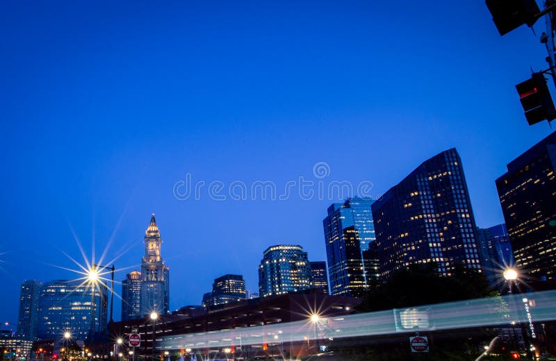Office buildings at night in Boston stock photo