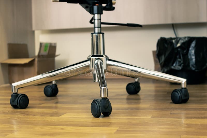 Office Chair Wheels on a Wood Floor Stock Photo Image of object