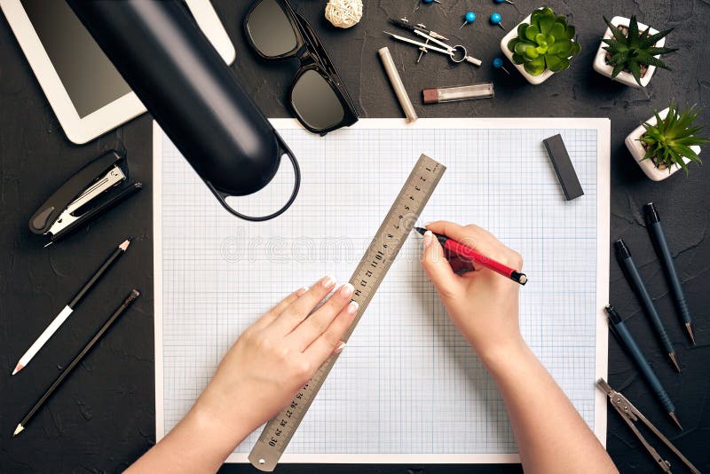 Office desk background hand with pen writing construction project ideas concept, With tablet, drawing equipment and lamp royalty free stock image Office desk background hand with pen writing construction project ideas concept, With tablet, drawing equipment and lamp royalty free stock image