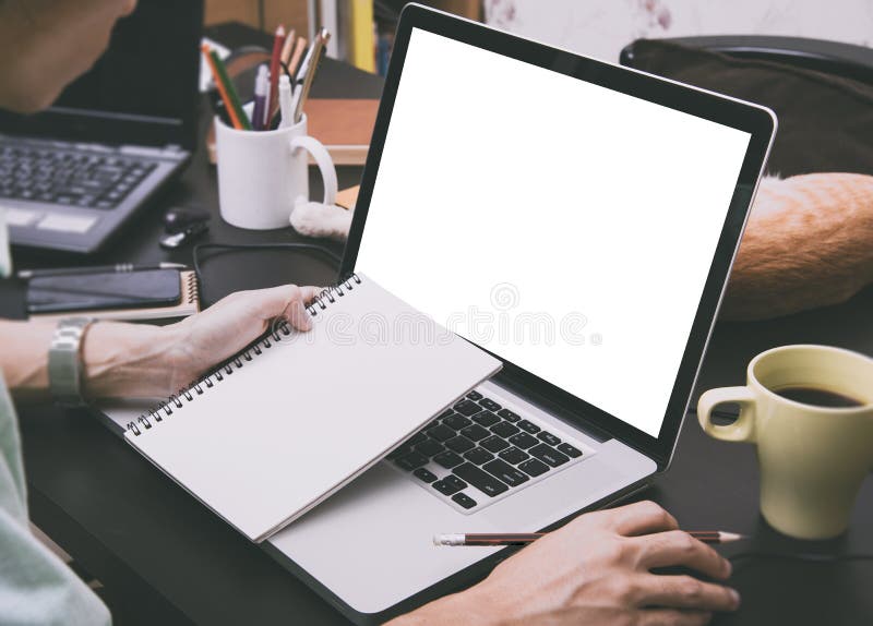 Office Desk with Business Hand Working on Computer Notebook. Stock