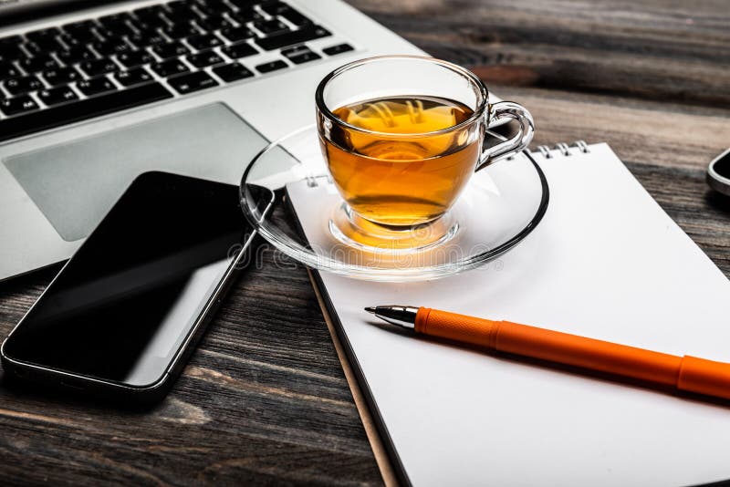 Office Desk with Laptop Computer and Cup of Tea Stock Image Image of