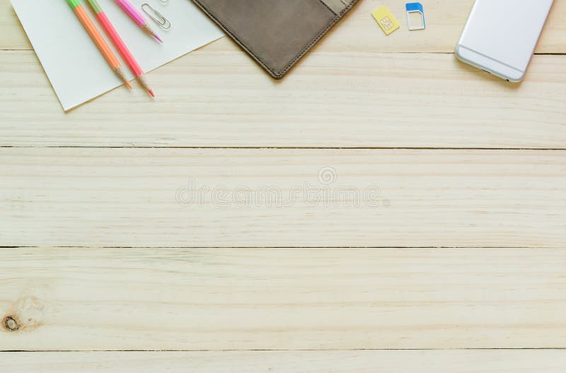 Office Desk Mock Up Template with Tablet, Notebook and Pen. View Stock