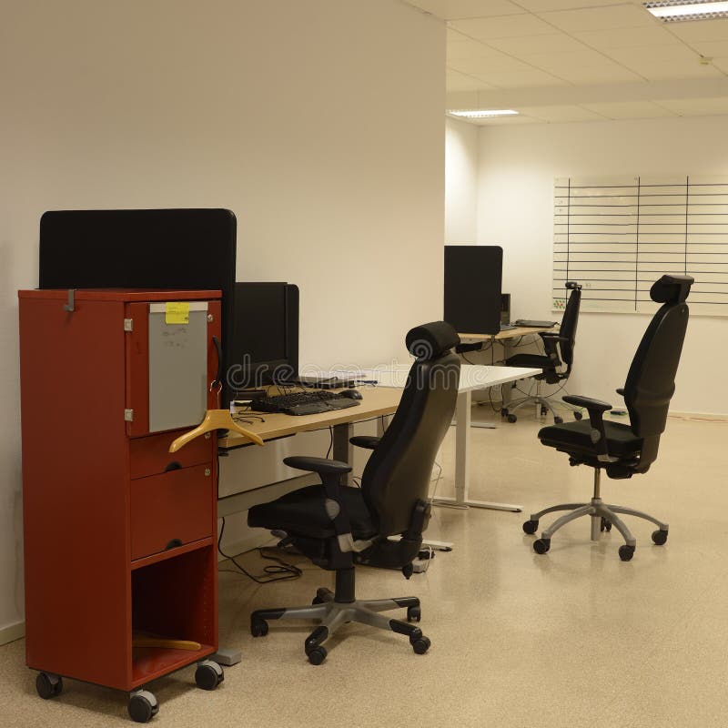 Office Desks and Chairs editorial stock photo. Image of blinds 100837043