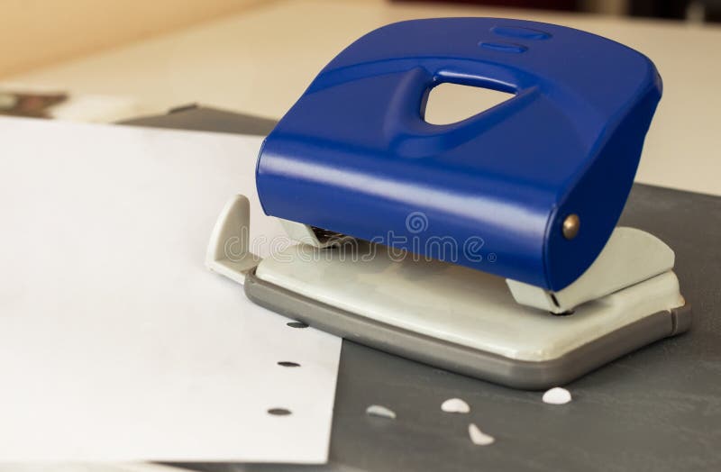 Office Equipments Hole Puncher Stock Image Image of pile, confetti