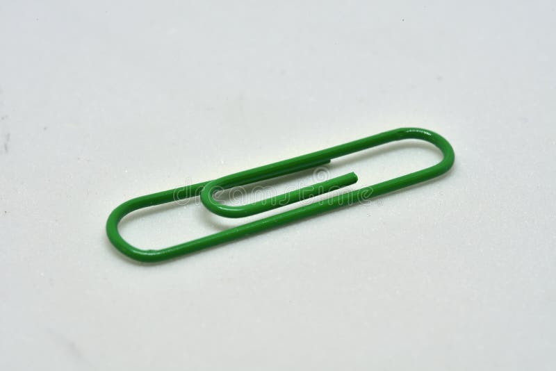 Office green paper clip stock image. Image of metal 111312395