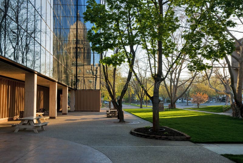 Office Park with reflection of the Capital Buildin. Glass building with the reflection of the Idaho state capital stock photo Office Park with reflection of the Capital Buildin. Glass building with the reflection of the Idaho state capital stock photo