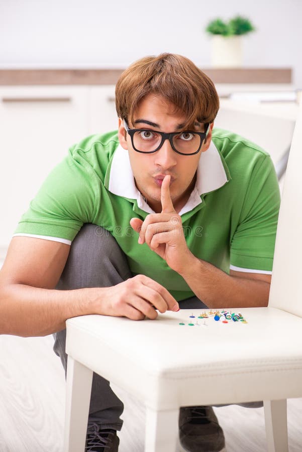 The Office Prank with Sharp Thumbtacks on Chair Stock Photo Image of