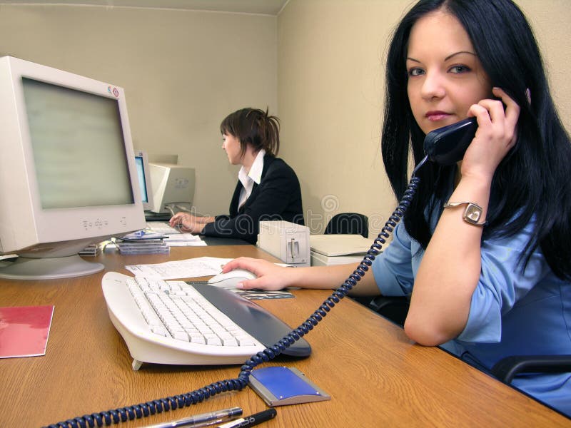 Office scene 2. Women working in front of computers. A regular office scene that can fit many marketing concepts Office scene 2. Women working in front of computers. A regular office scene that can fit many marketing concepts