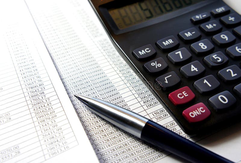 Office Table with Calculator, Pen and Accounting Document Stock Image