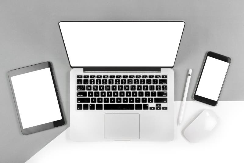 Office Table with Laptop Computer, Digital Tablet, Smartphone, P Stock