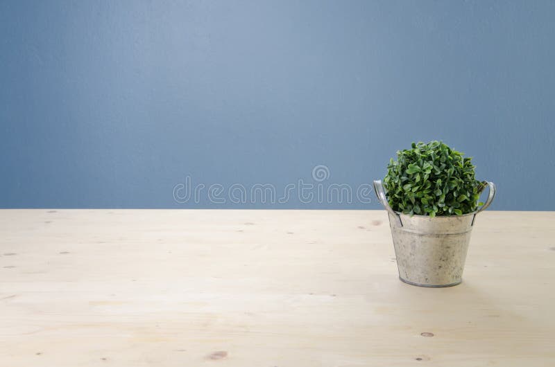 Office table with tree on basket, View from front with Green Le