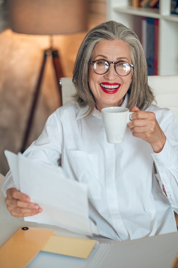 Welldressed and Goodlooking Businesswoman in the Office Stock Image Image of papers