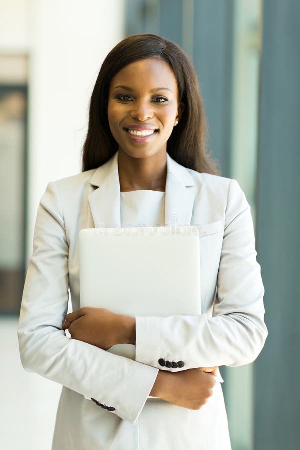 Office worker holding laptop stock photos