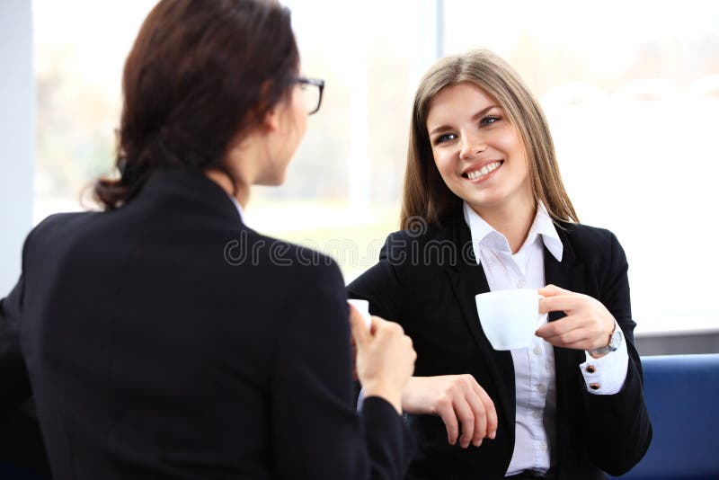 Office workers on coffee break, woman enjoying chatting royalty free stock image Office workers on coffee break, woman enjoying chatting royalty free stock image