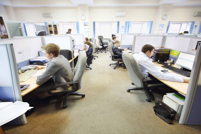 Office workers of company RUSELPROM sit at computers